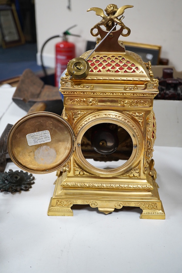 A 19th century French ormolu clock, striking on a bell, 34cm high. Condition - good